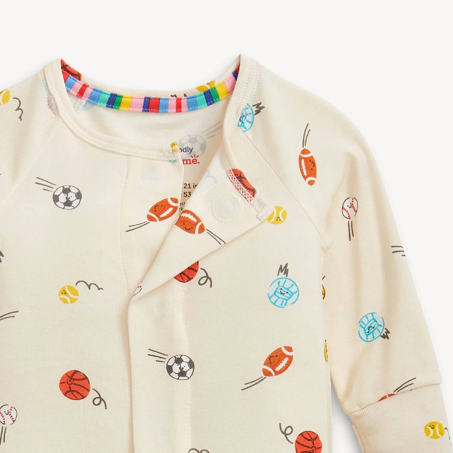 Baby onesie with sports-themed print on a white background