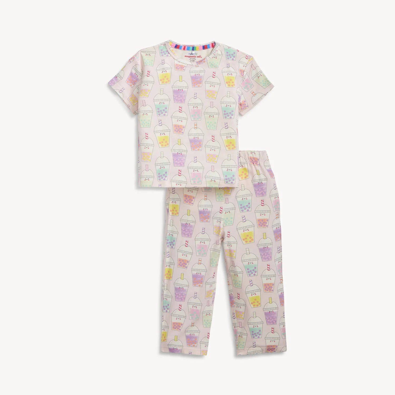 Children's pajama set with pastel cupcake pattern on a white background