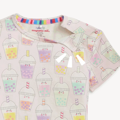 Children's shirt with bubble tea pattern and colorful collar on a white background