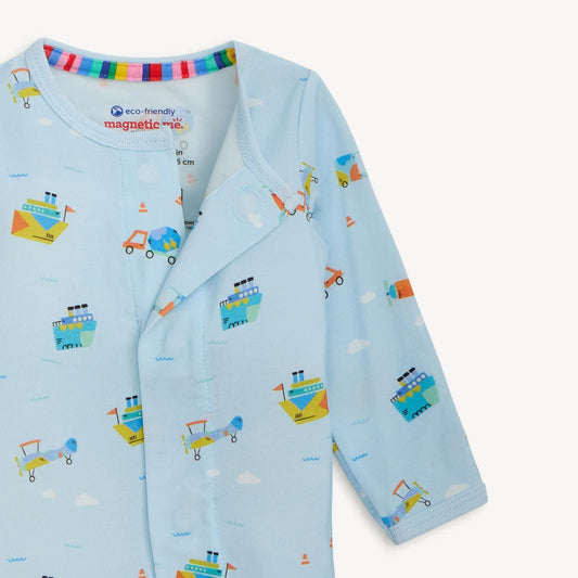 Children's cardigan with vehicle pattern on a light blue background