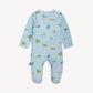 Baby onesie with vehicle pattern on a light blue background