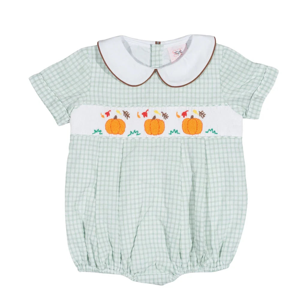Green checkered baby romper with pumpkin design on a white background