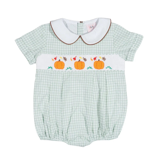 Green checkered baby romper with pumpkin design on a white background