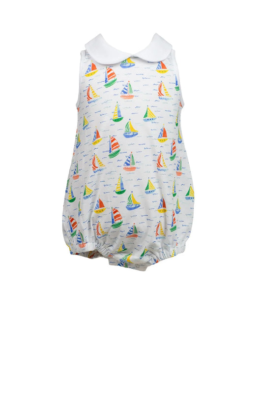 Baby romper with sailboat pattern on a white background