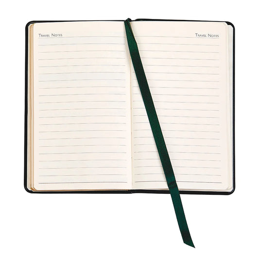 Open notebook with lined pages and a green ribbon bookmark on a white background