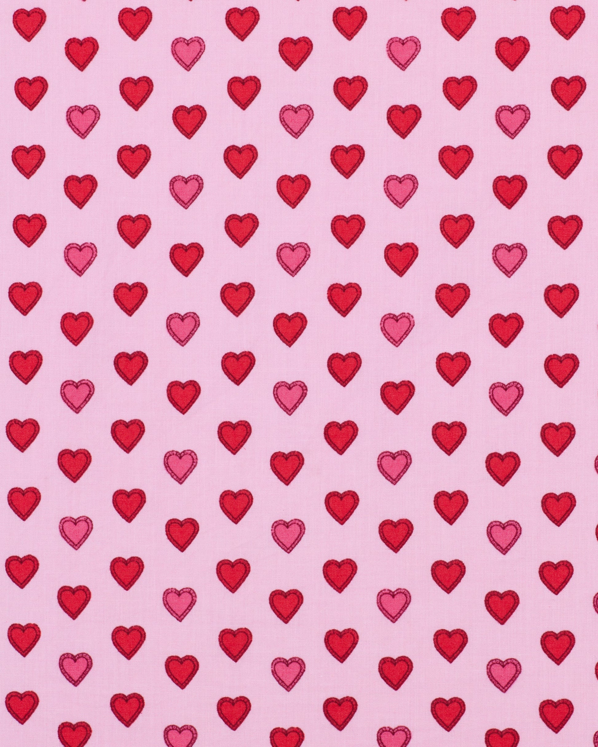 pink background with red and pink hearts