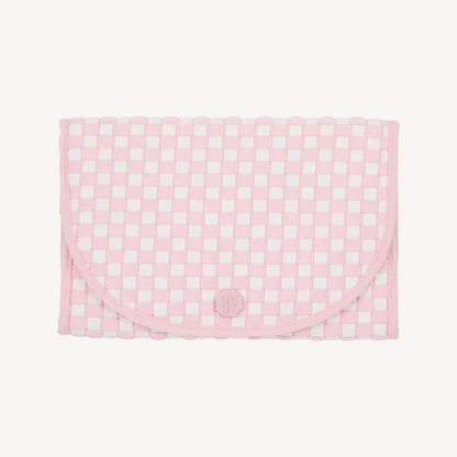 Pink and white checkered blanket on a white background