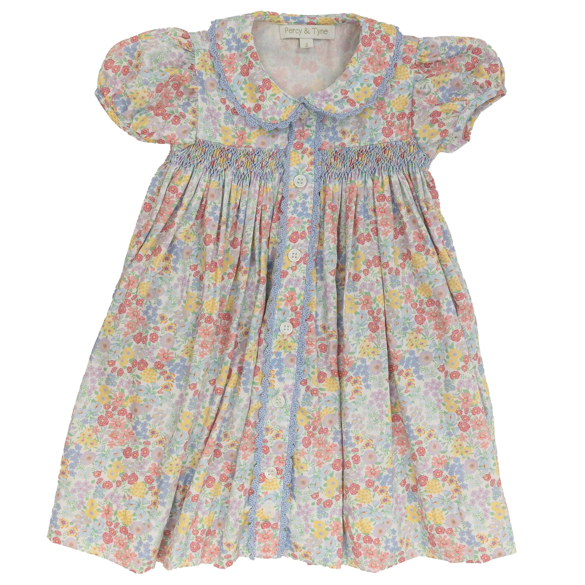 Floral dress with puff sleeves on a white background