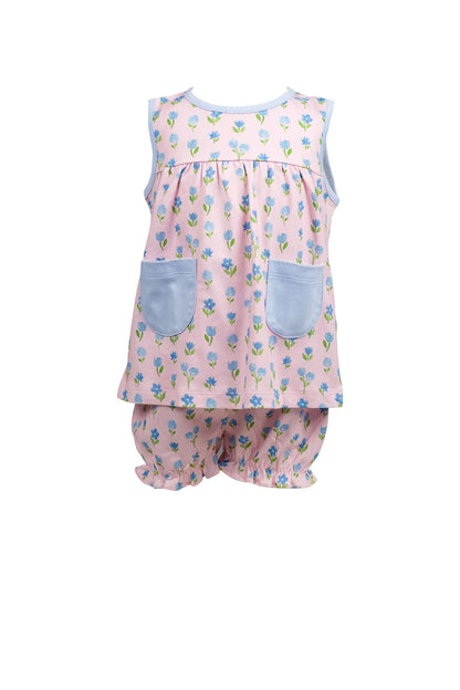 Children's outfit with floral pattern on a white background