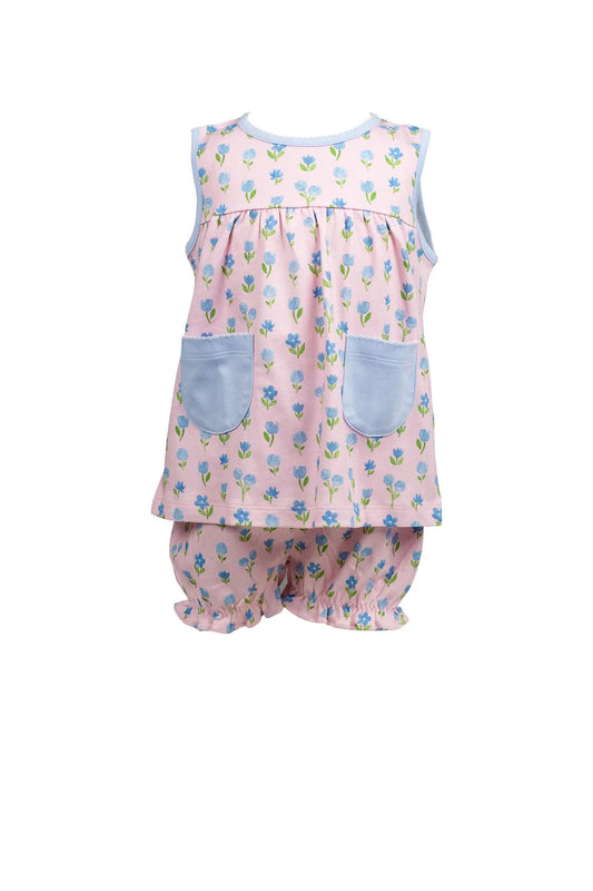 Children's outfit with floral pattern on a white background