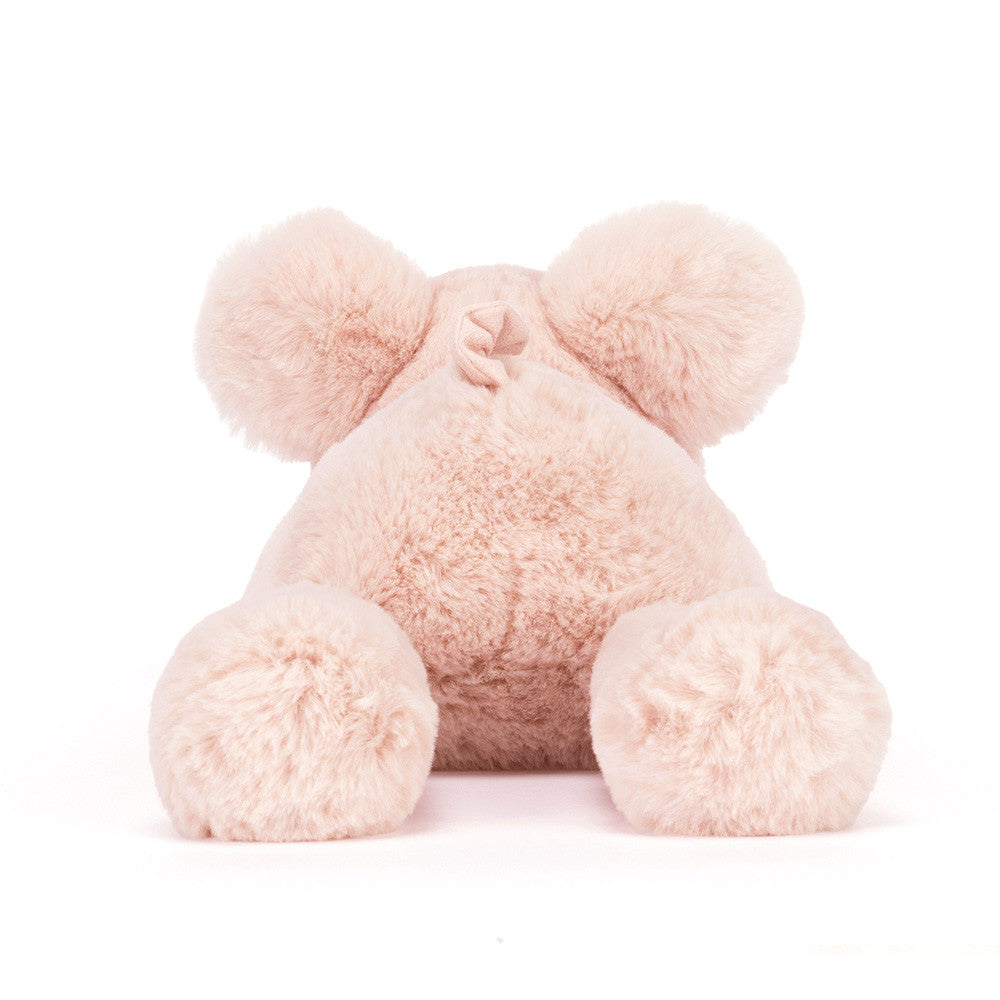 Pink teddy bear on a white background