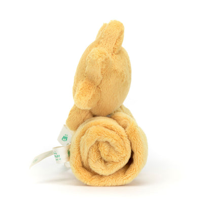 A plush toy in the shape of a sun with a smiling face, attached to a golden security blanket or soother.