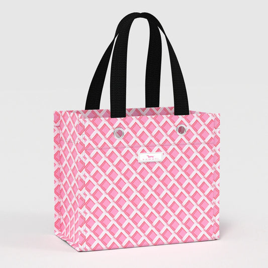 Pink lattice patterned tote bag with black handles on a light gray background