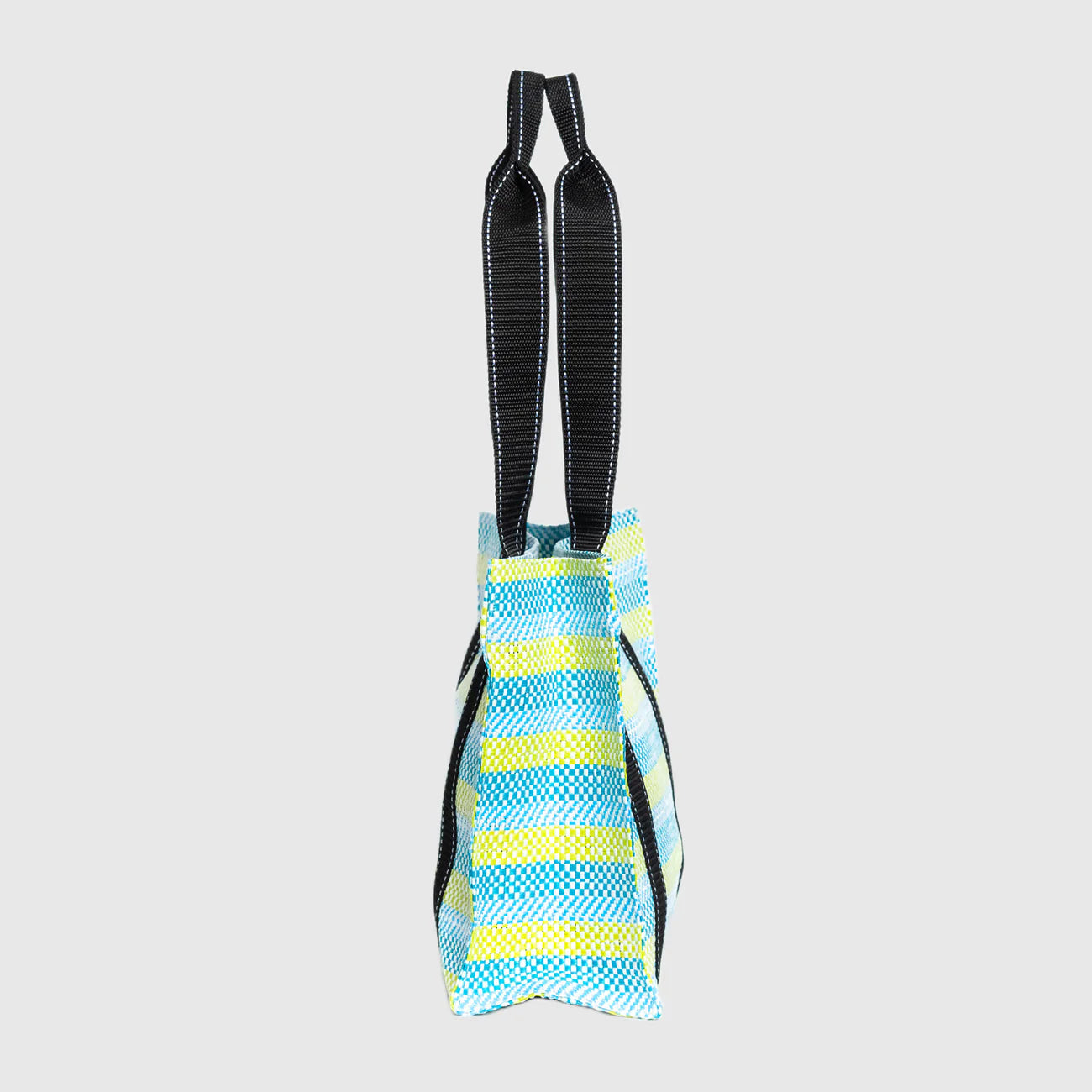 Blue and yellow striped dog toy with black handles on a light gray background