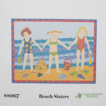 Cross-stitch pattern of three children on a beach with sandcastles and buckets, labeled 'Beach Sisters' by Susan Winget Designs.