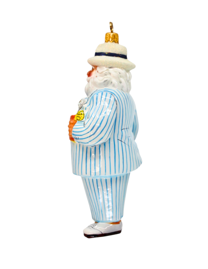 A vintage German Christmas ornament depicting a jovial man in a light blue and white striped suit, white hat, and white beard, shown from the back against a plain white background.