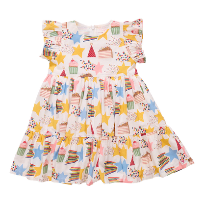 Colorful children's dress with star and cake pattern on a white background