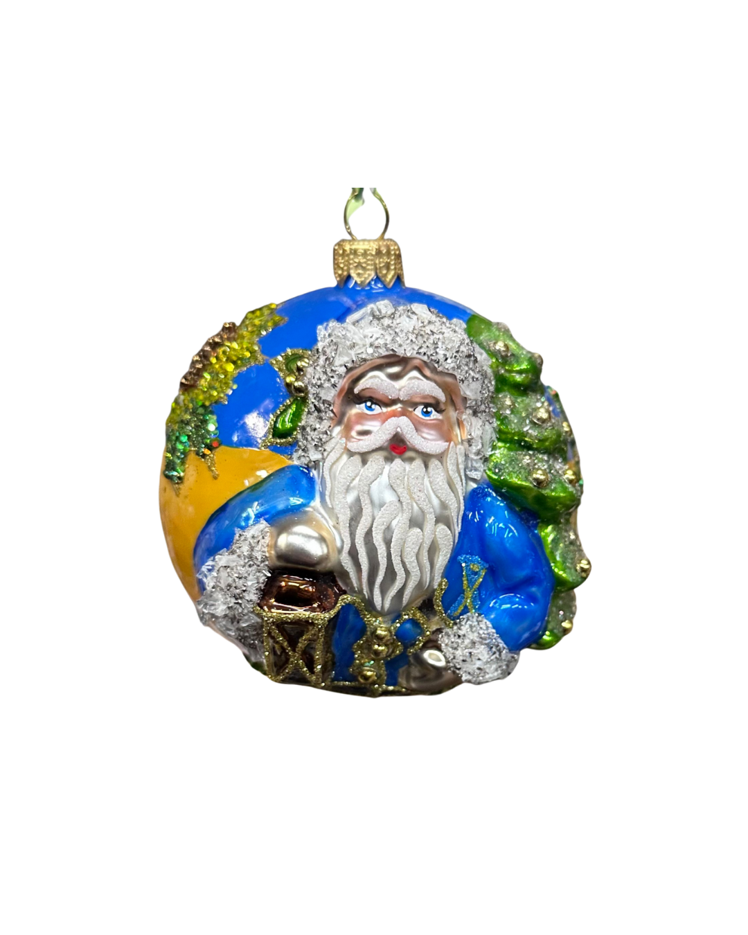 Decorative Christmas ornament of a Santa Claus figure with a blue background.