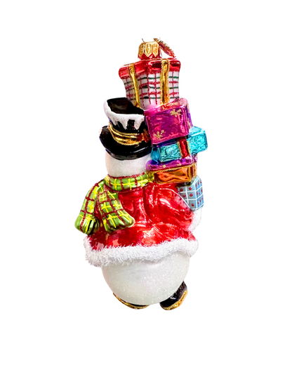 Decorative ornament of a Santa Claus figure with gifts on a white background