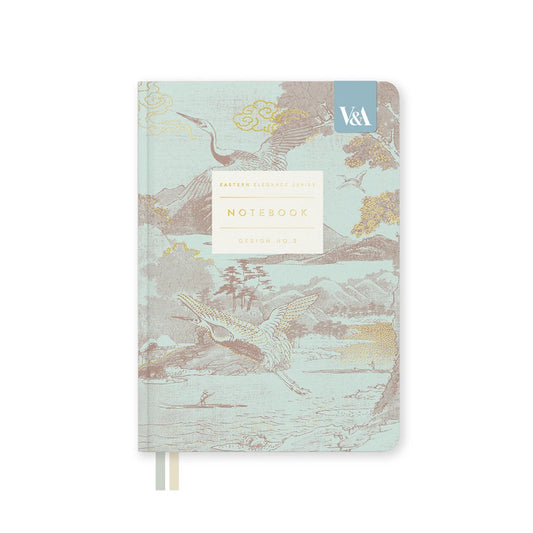 Notebook with bird illustration on a light blue background