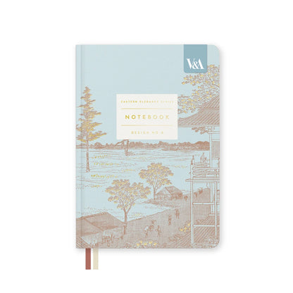 Notebook with scenic cover design on a white background
