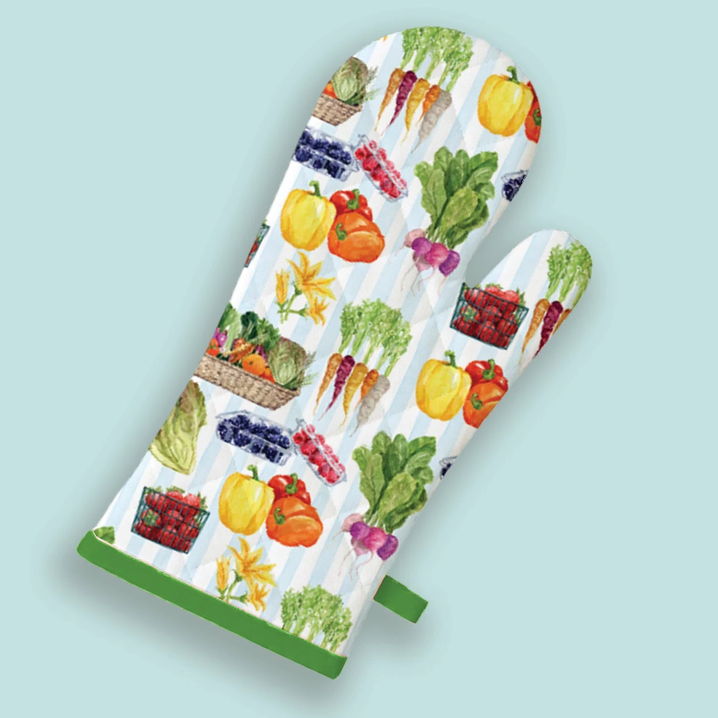Pair of oven mitts with vegetable pattern on a light blue background