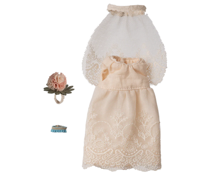 A doll or baby dress outfit set on a plain white background, featuring a cream lace dress with a bow at the bust, a matching sheer veil, a small pink flower headband, and a small blue-and-gold hair pin.