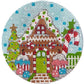 Cross-stitched gingerbread house design on a circular fabric swatch.