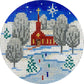 Circular needlepoint ornament with a winter scene featuring a church and people skating.