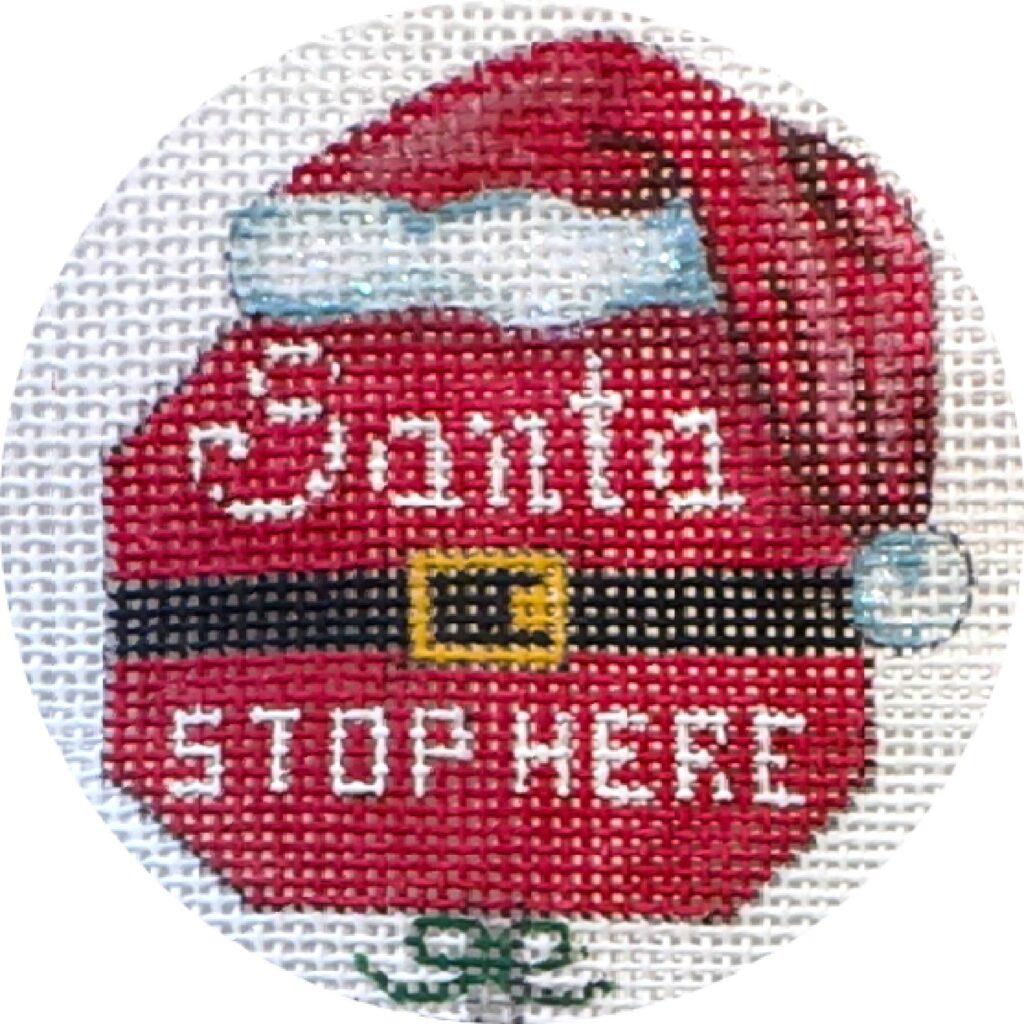 Decorative plate with Santa Claus design and 'Santa Stop Here' text on a white background