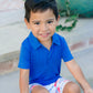 Blue short sleeve polo styled with blue and white shorts with red lobster pattern