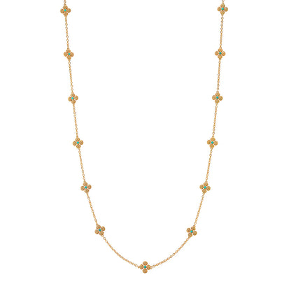 Gold necklace with turquoise stones on a white background