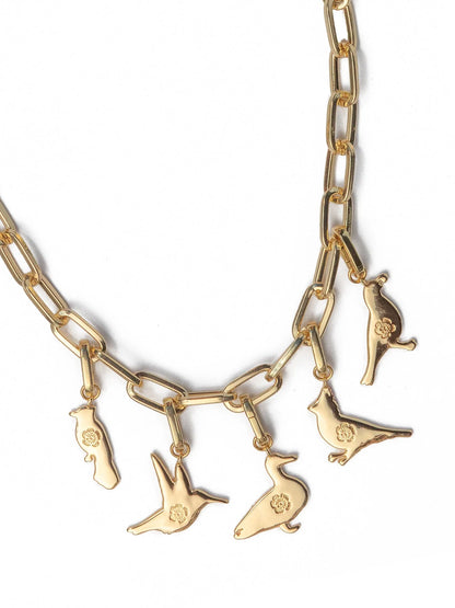 Gold chain necklace with bird-shaped pendants on a white background