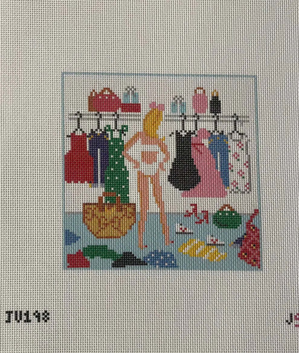 Cross-stitched panel of a woman in a dressing room with various clothing items and accessories.