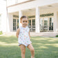 White one piece outfit with sailboat pattern