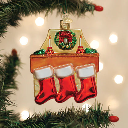 Family of three stockings on fireplace mantel glass ornament Old World Christmas 