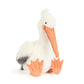 Stuffed toy pelican on a white background