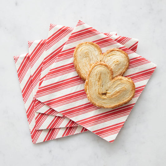Heart-shaped cookies on a red and white striped napkin