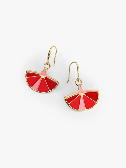 Pair of red and pink fan-shaped earrings on a white background