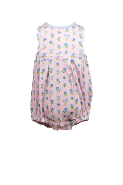 Pink floral baby romper on a white background