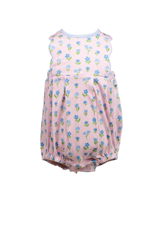 Pink floral baby romper on a white background