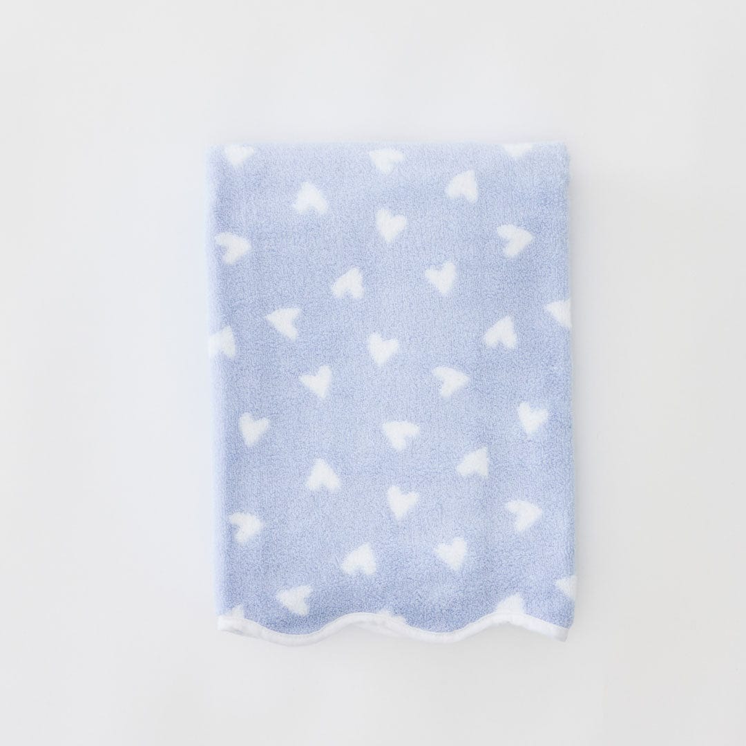 Light blue fabric with white heart pattern on a light gray background