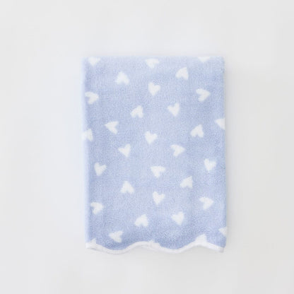 Light blue fabric with white heart pattern on a light gray background