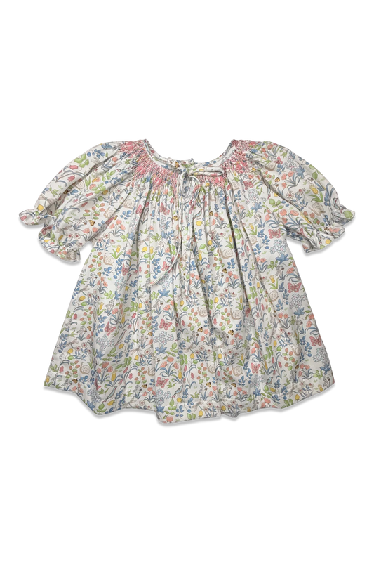 Floral dress with puff sleeves on a white background
